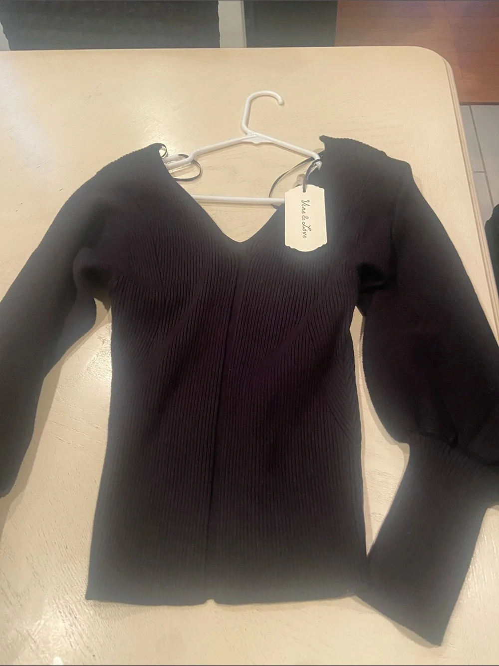 Vine & Love Black Ribbed V-Neck Puff-Sleeve Sweater